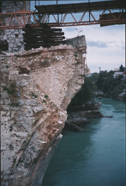 The Old Bridge (16th C) connecting Croat and Bosniak sides of Mostar, destroyed in 1993 during the war. Rebuilt and reopened 23 July 2004. Photo by author